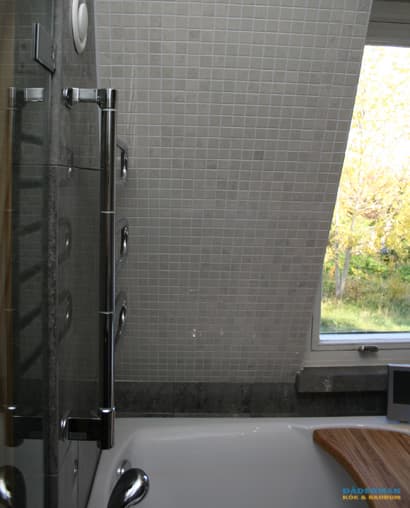 Badrum med stenkänsla och bastu