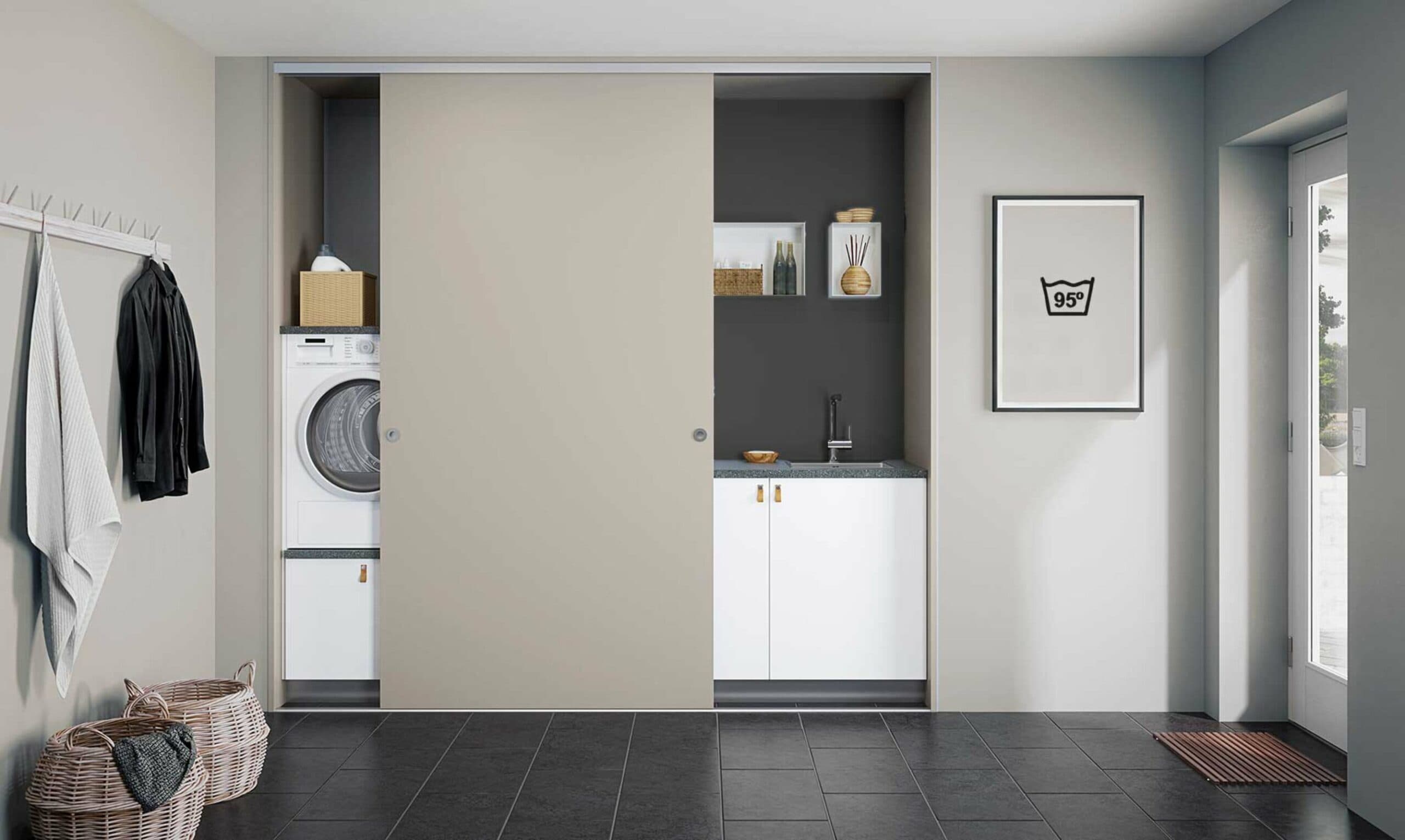 Ballingslöv- praktisk tvättstuga bakom skjutdörrsparti